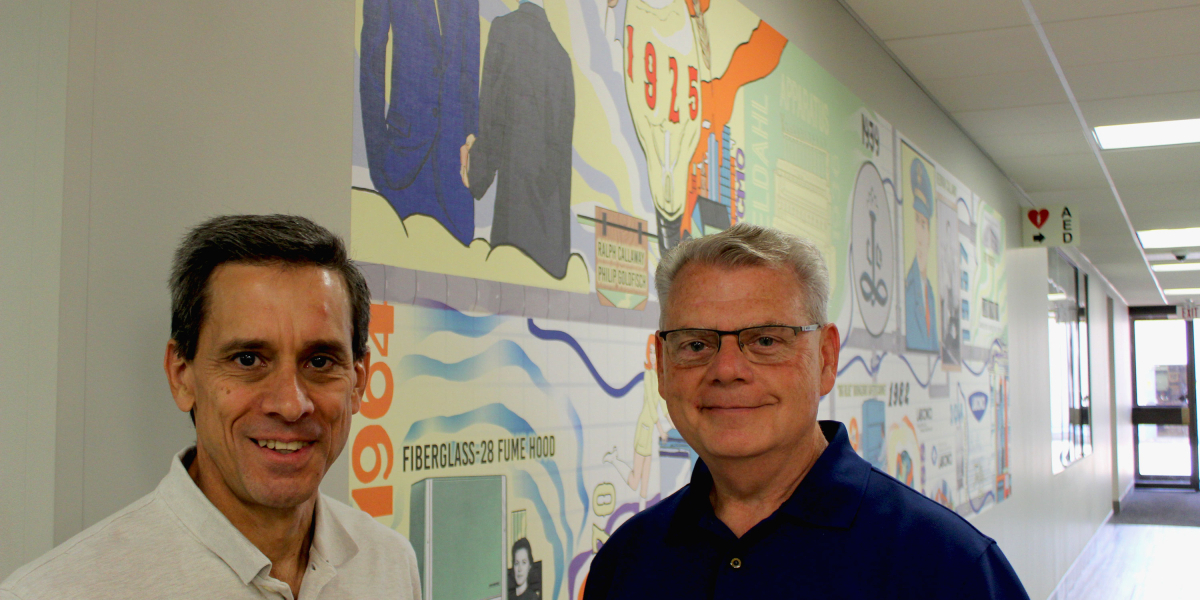 Labconco History Mural and Vice President of Operations Mark Schmitz with KCAI Sponsored Studio Director Randy Williams