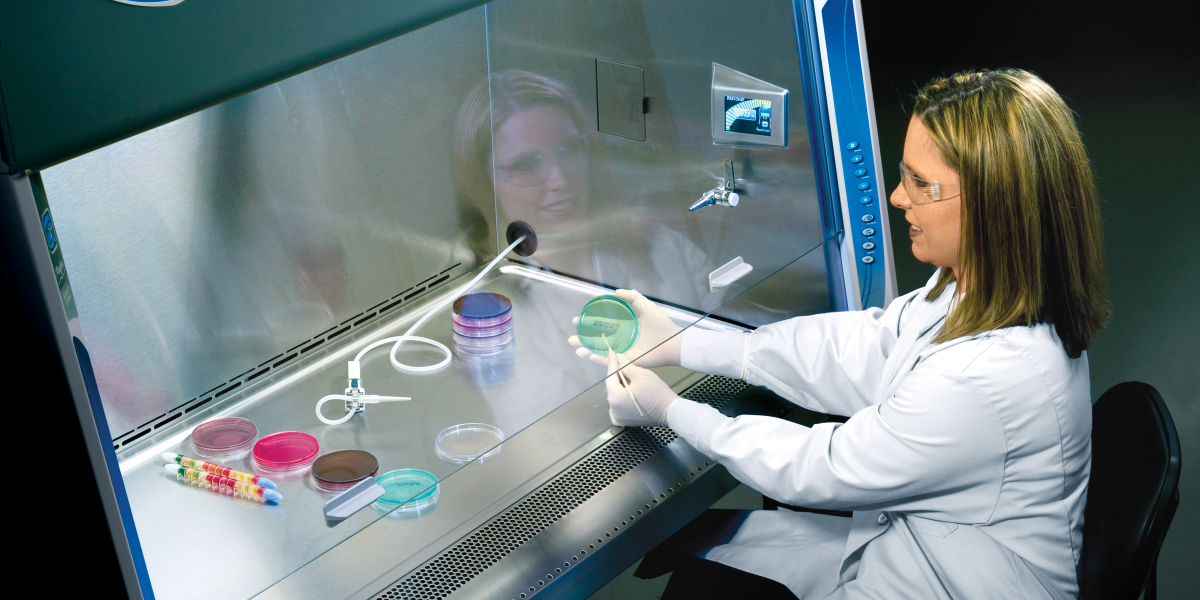 Scientist Working in Labconco Class II Biosafety Cabinet